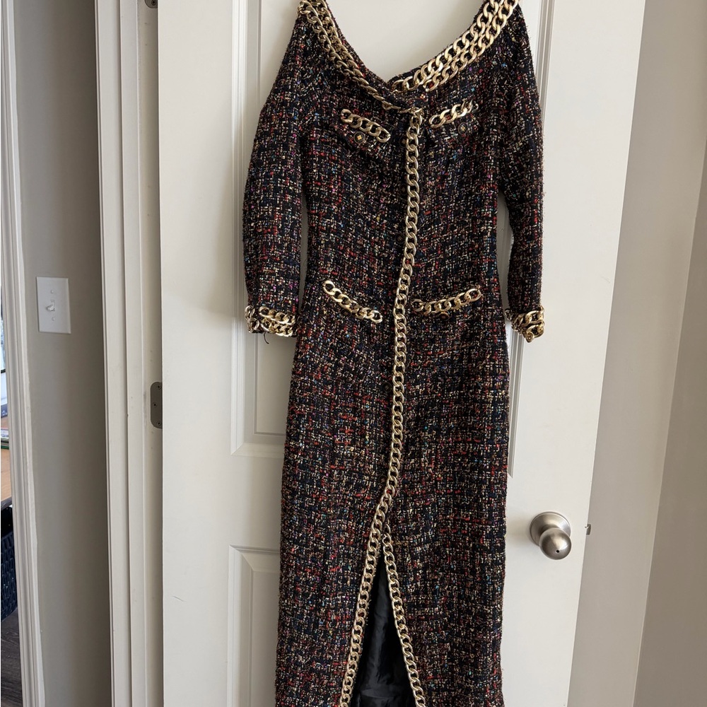 Elegant Black and Gold Chain-Trimmed Dress
